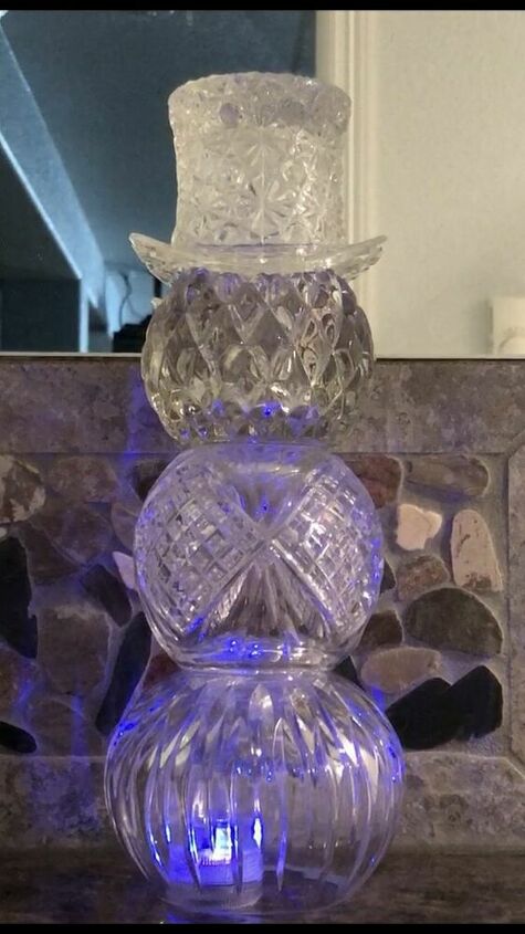 boneco de neve com porta velas de vidro