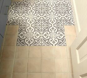updating a bathroom floor with tile stickers
