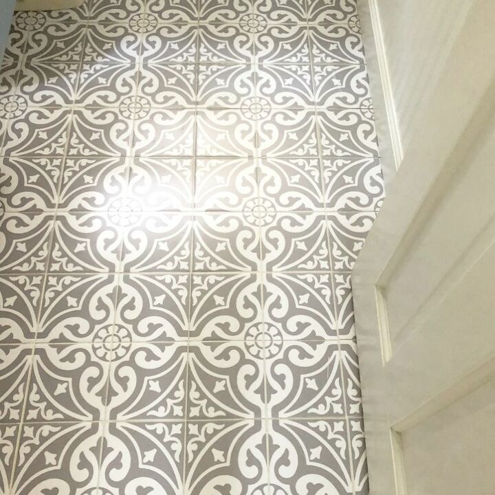 updating a bathroom floor with tile stickers