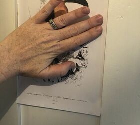 how to use free printables to decorate a downstairs bathroom door