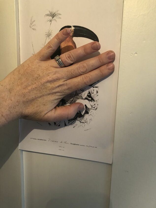 how to use free printables to decorate a downstairs bathroom door
