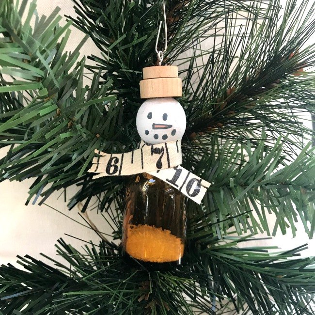s 25 unconventional christmas ornament ideas for 2019, Bottle snowmen ornaments