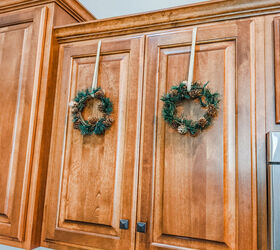 easy and beautiful kitchen cabinet christmas wreaths, After the Christmas wreaths have been added