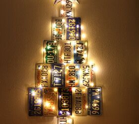 s 17 ways people are repurposing items to make christmas decor, A Christmas Tree Made From Old License Plates