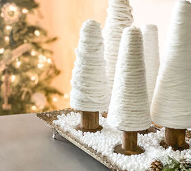 s 17 ways people are repurposing items to make christmas decor, Upcycled Ribbon Spool Christmas Trees