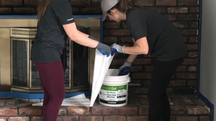 how to apply german schmear to give your brick fireplace a new look