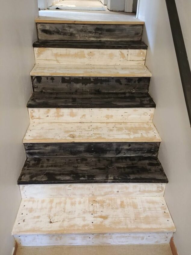 makeover your stairs urban rustic style, This is after the first coat