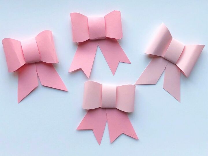 adornos de papel en forma de roseta