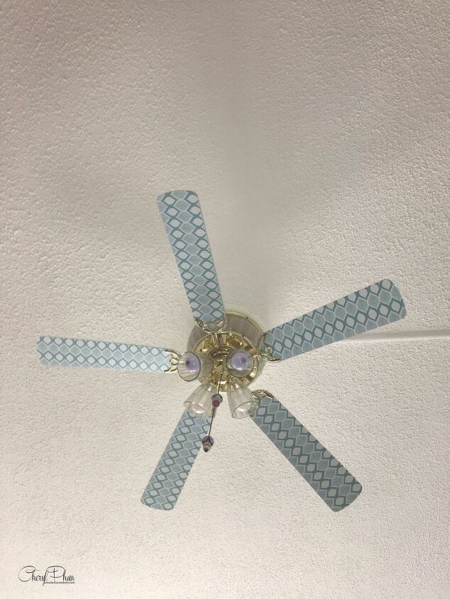 update your ceiling fan with contact paper from the dollar tree for 1