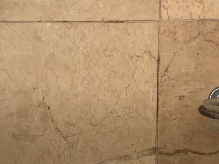 q how do i bleach old mold stains out of my shower grout