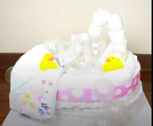 boss your next baby shower with this baby shower diaper cake