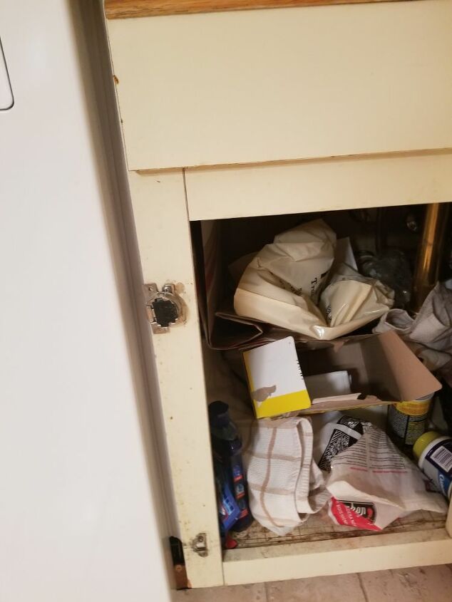 q fix a kitchen cabinet door