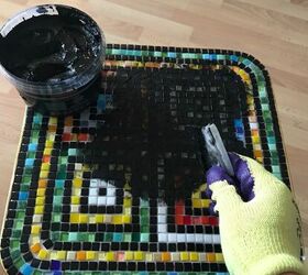 how to transform an old coffee table into a piece of functional art, Grout the tiles