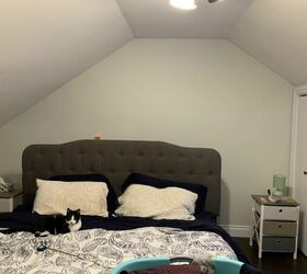 How she used this awkward sloped ceiling to make her bedroom look amazing