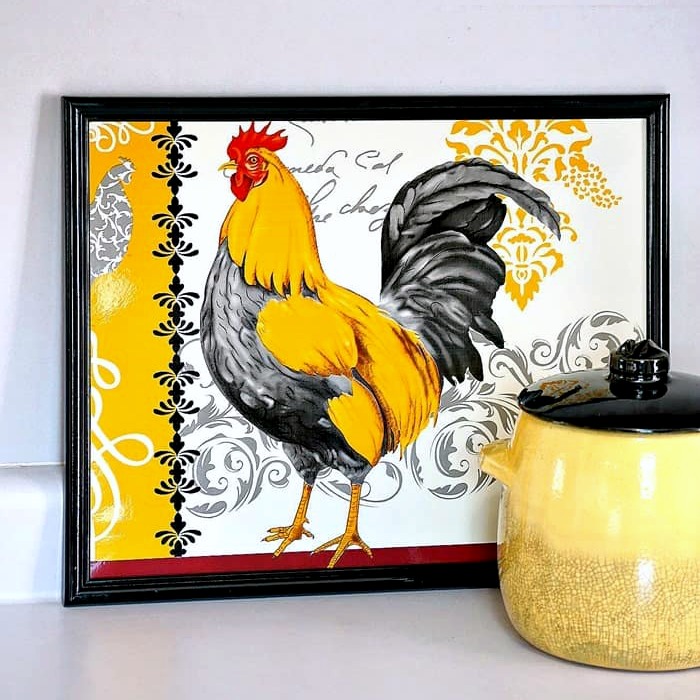 frame a rooster placemat and hang it on the wall