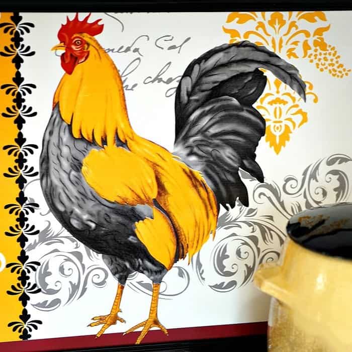 frame a rooster placemat and hang it on the wall