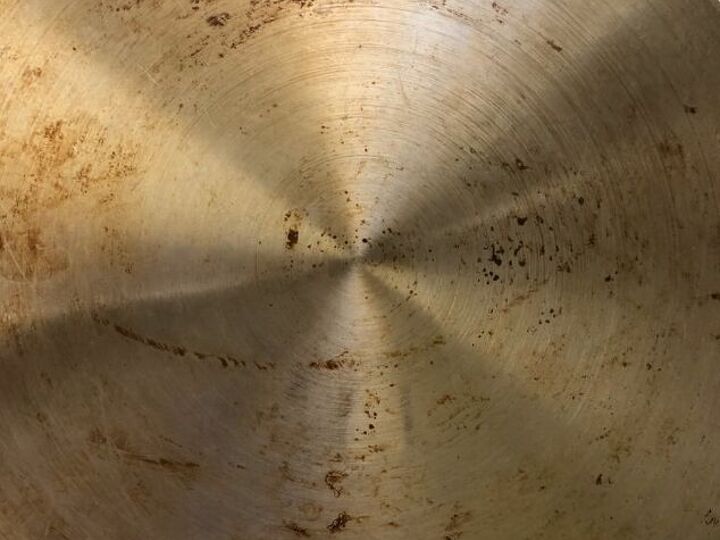 q how to clean the bottom of pots and pans