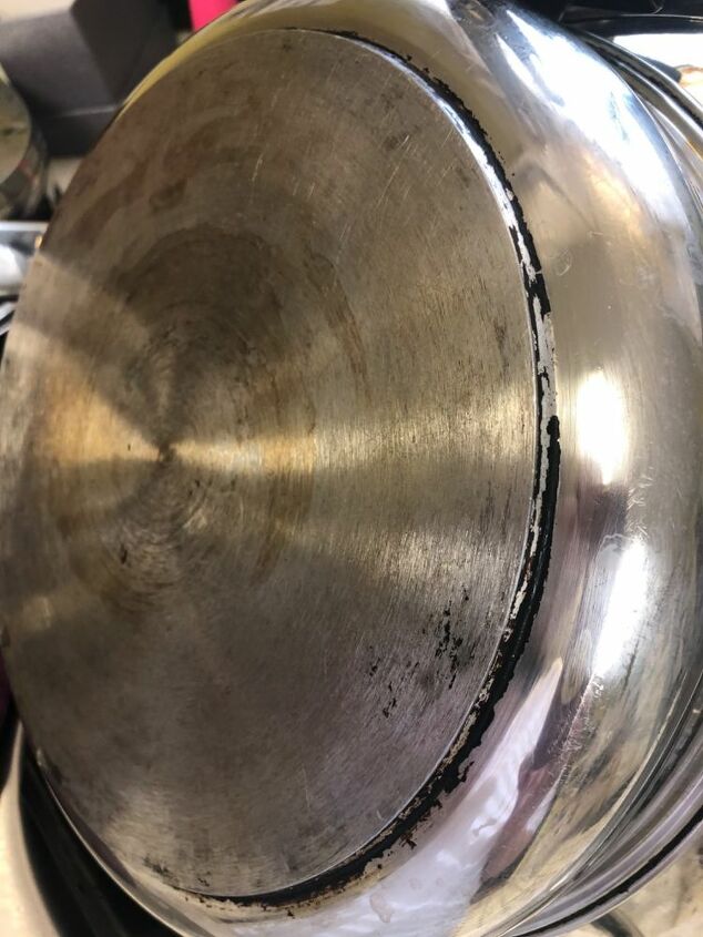 q how to clean the bottom of pots and pans