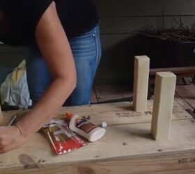 how to build a coffee table ottoman out of an ammunition crate, Sand attach legs with glue
