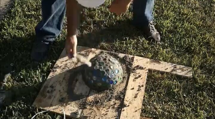 how to use dollar store bowls to make mushroom solar lights, Wipe Surface with Sponge
