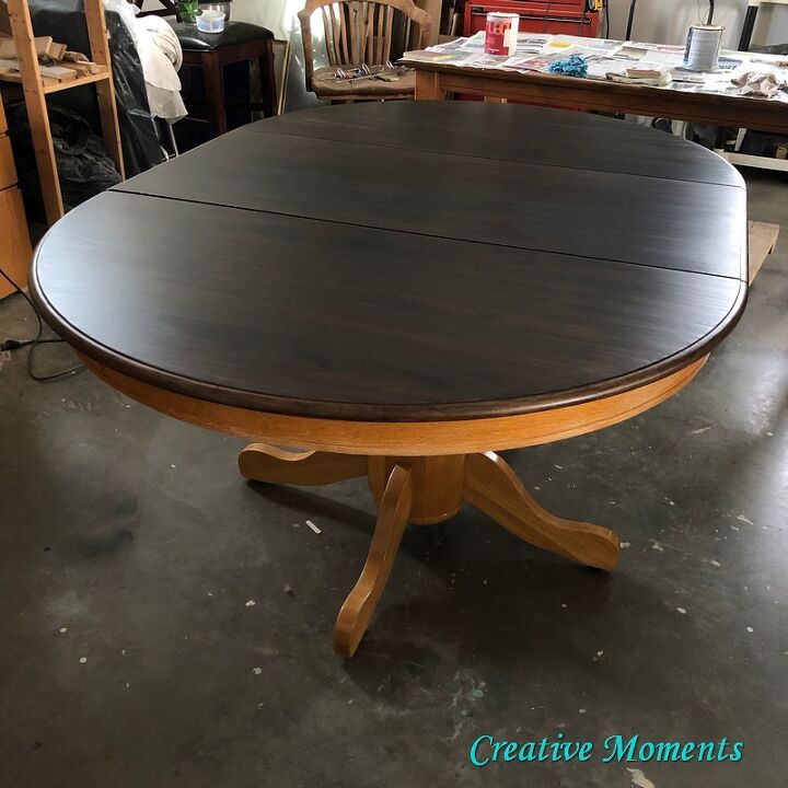 oak dining table is stained over existing finish