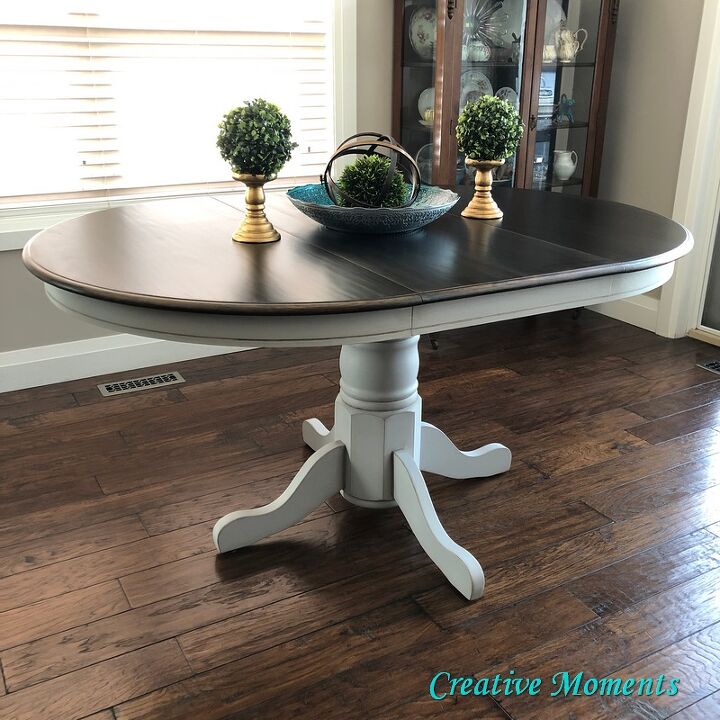 oak dining table is stained over existing finish