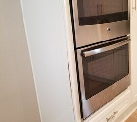 how can i repair bowing on the side of this double oven cabinet