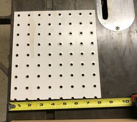 tips for accurately installing cabinet hardware, Scrap of pegboard for accurate hole drilling