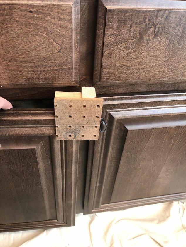tips for accurately installing cabinet hardware, Jig in place for drilling