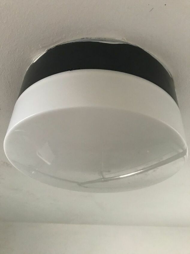 how do i replace the bulb in this enclosed bathroom ceiling light