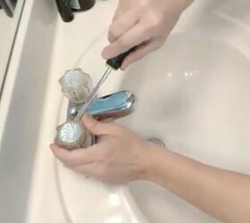 how to replace cartridges to fix a leaky bathroom sink, Remove the Faucet Covers or Handles