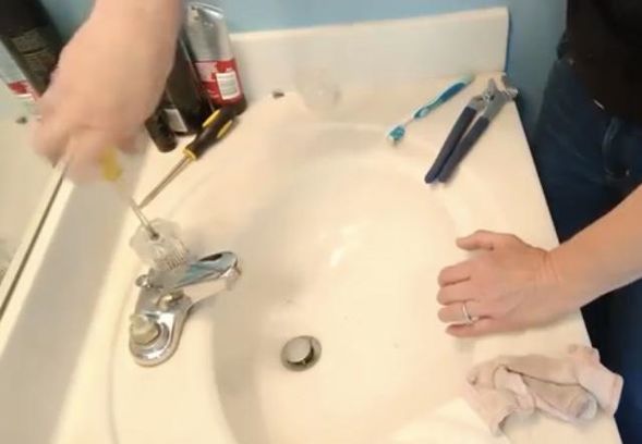 how to replace cartridges to fix a leaky bathroom sink, Reinstall Faucet Covers