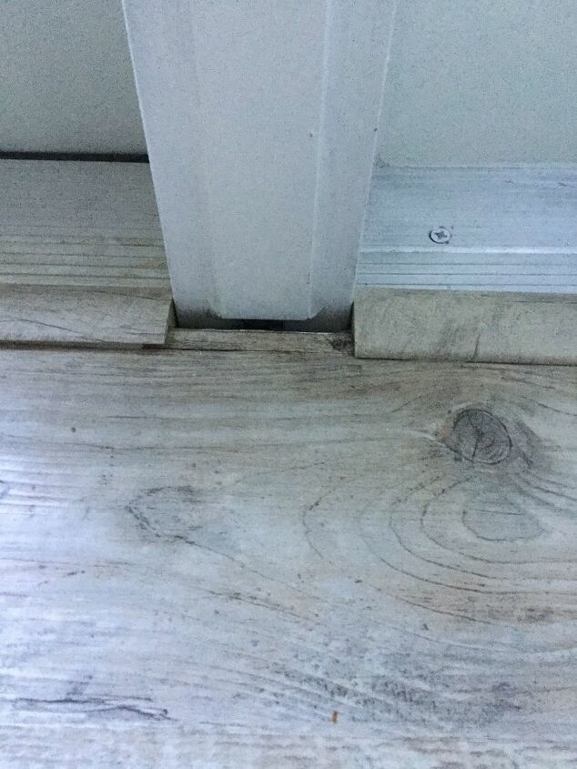 how can i fix the trim on this vinyl plank floor