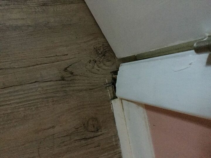 how can i fix the trim on this vinyl plank floor