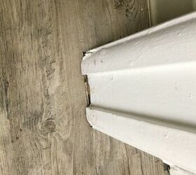 how can i fix the trim on this vinyl plank floor