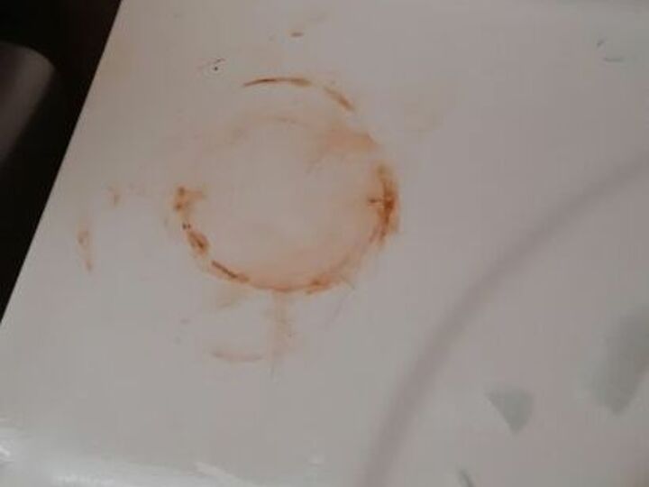 q how do i take this stain out of the sink