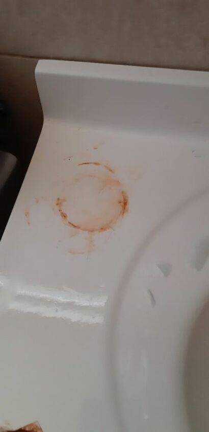 q how do i take this stain out of the sink