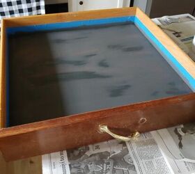She tapes off the inside of an old drawer & gets such clever wall decor