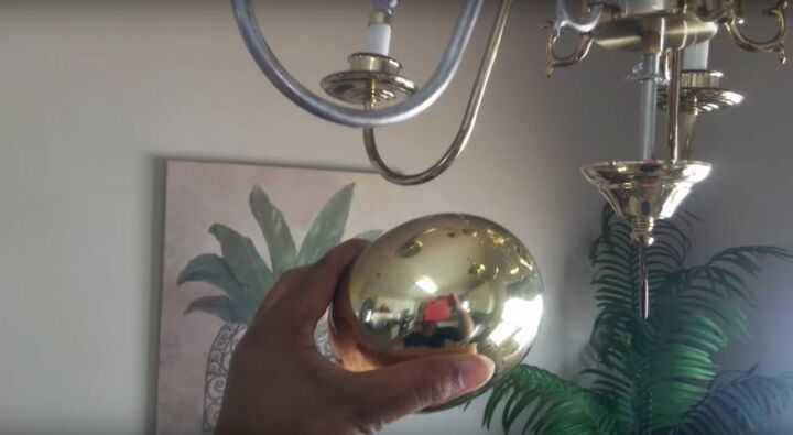 how to give your boring brass chandelier a glamorous makeover, Remove The Brass Ball