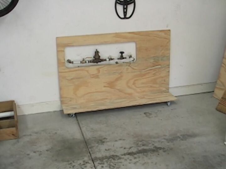 build a storage shelf to hide and protect pipes in your garage