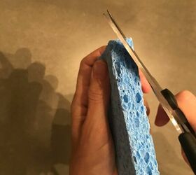 sponge painting a wall