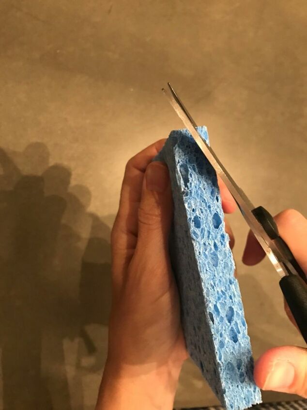 sponge painting a wall