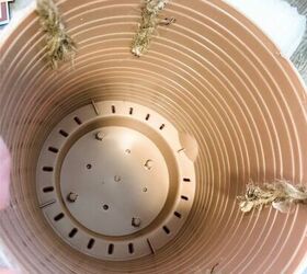 Glue bits of rope inside a planter for this designer decor hack