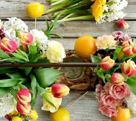 create a flower arrangement with citrus