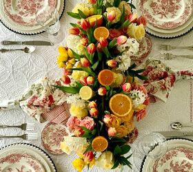 create a flower arrangement with citrus