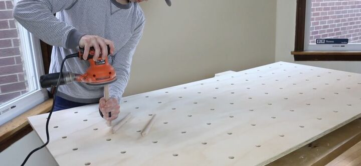 diy giant pegboard shelving without drilling into your walls, Trim Dowels and Sand