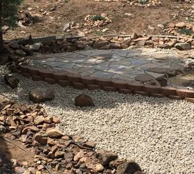 back yard makeover, Flagstone patio and lower level river rock