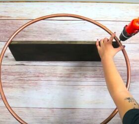 how to build a hula hoop shelf a stylish storage solution, Attach the Board to the Hoops
