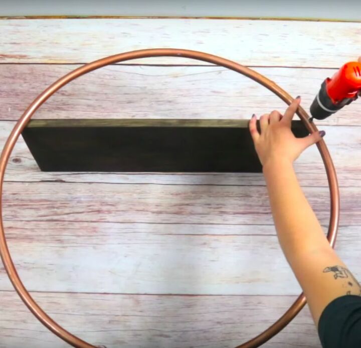 how to build a hula hoop shelf a stylish storage solution, Attach the Board to the Hoops