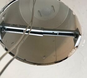 how to replace recessed lighting with a chandelier, first part of the adapter installed in can